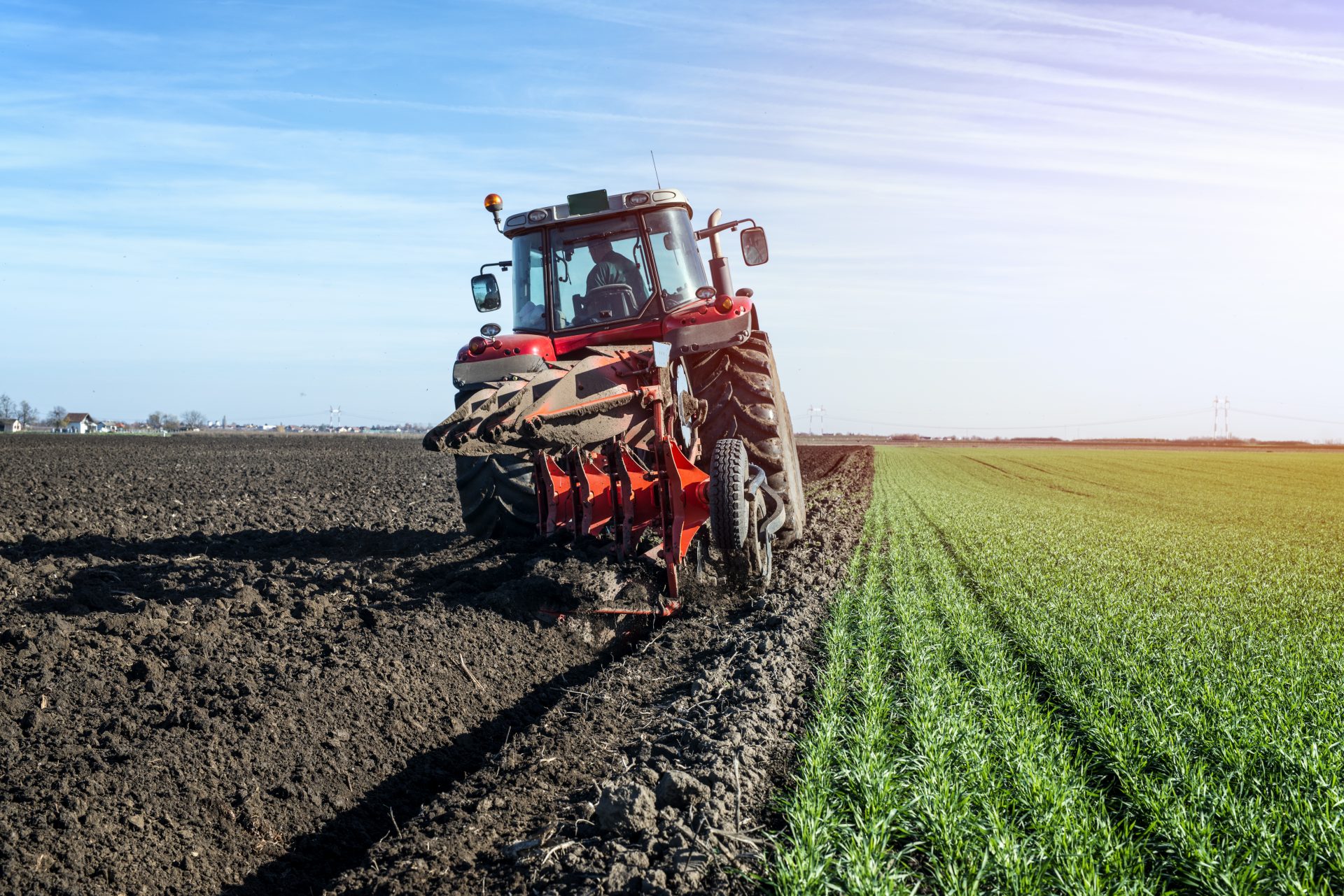 tractor-agricultural-machine-cultivating-field